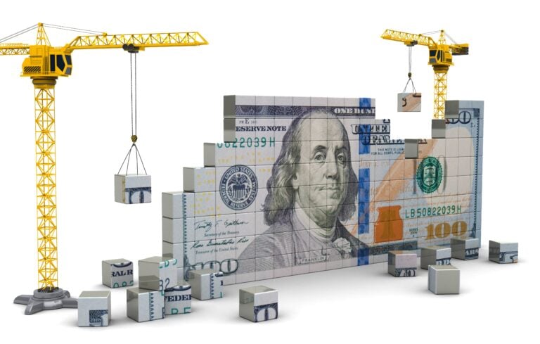 cranes building money