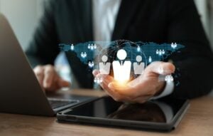 Person holding graphic of interconnected community