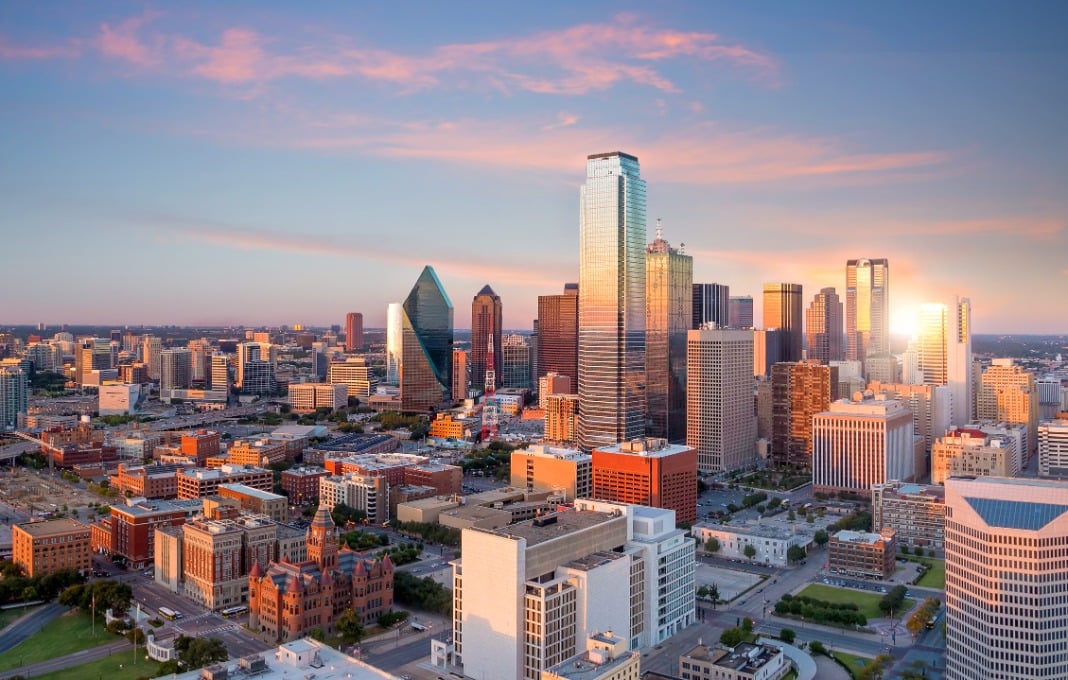 Dallas, Texas cityscape with blue sky at sunset