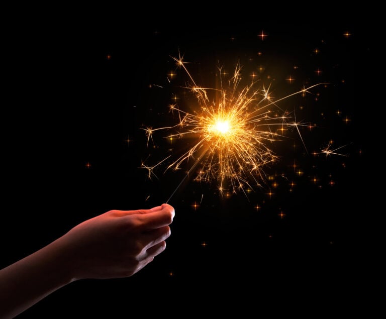 Hand holding sparkler