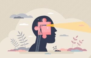 Vector illustration of man looking outside of profile of a head