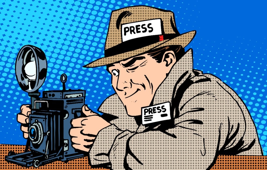 Photographer paparazzi at work press media camera